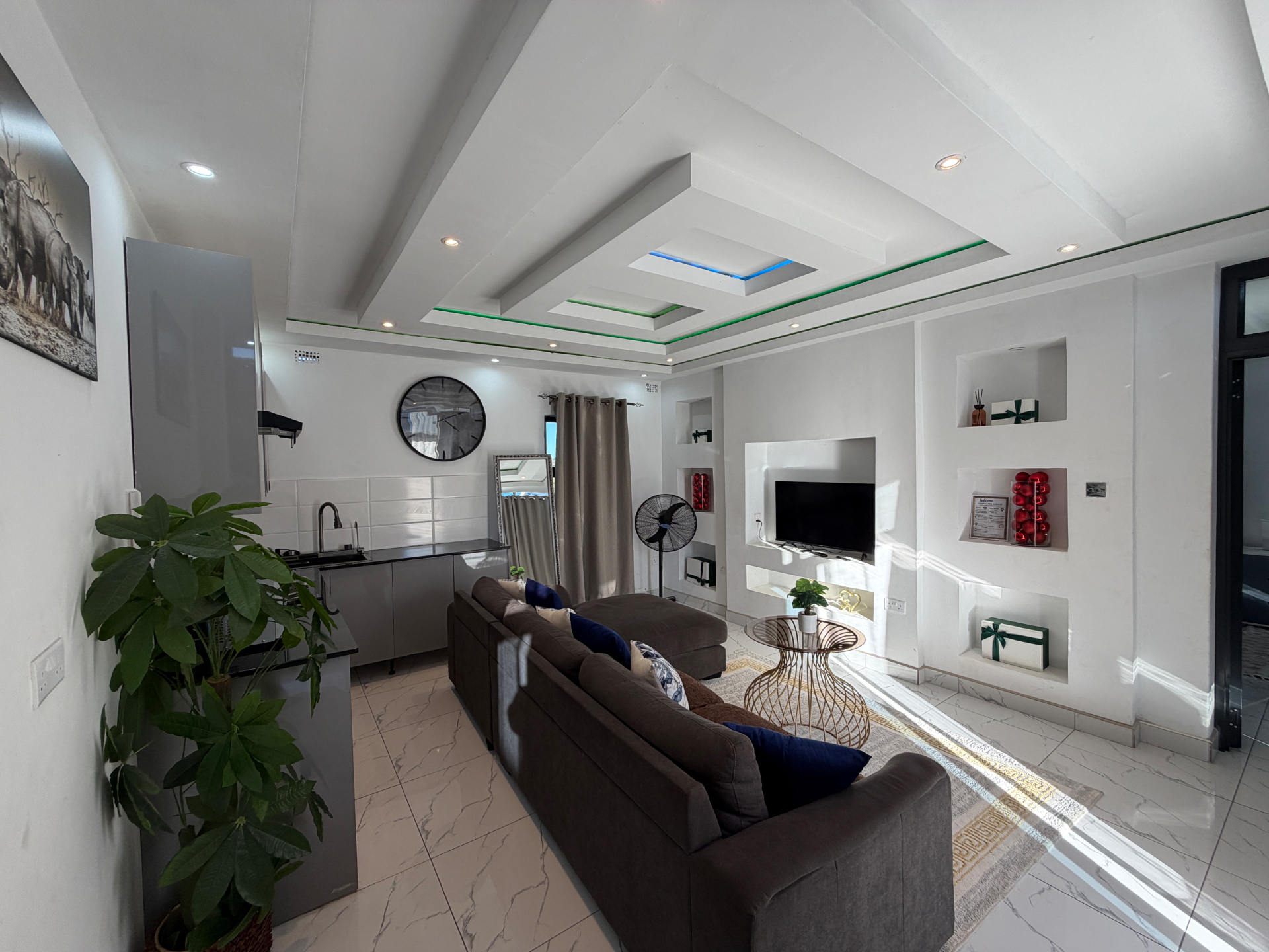 Room with Lounge at Lions Gate Villas — the private lounge and kitchenette